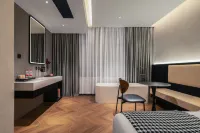 โรงแรม LIA (สถานีรถไฟใต้ดินกังเซี่ย ศูนย์การประชุมและนิทรรศการฟูเทียน เซินเจิ้น) โรงแรมใกล้สวนสาธารณะ ฟุกุชิมะ ซิงเกะ