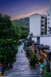 Gunai Apartment (Dongguan International Trade Center) - vue sur la montagne