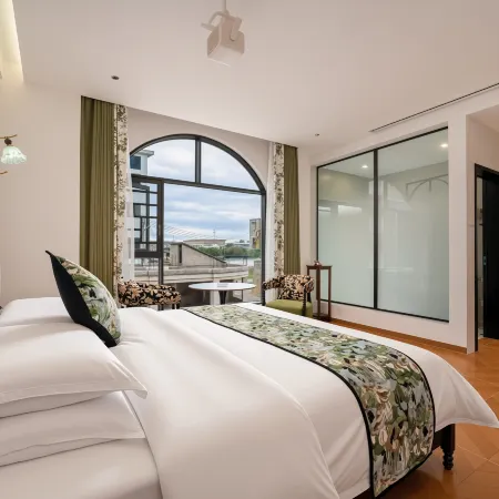 Miyou Smart Homestay (Xingyi Wanfenglin Airport South Railway Station)