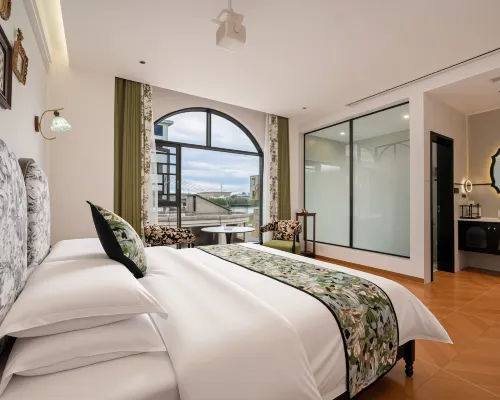Miyou Smart Homestay (Xingyi Wanfenglin Airport South Railway Station) Hotel di Xingyi