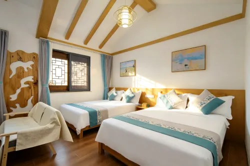 Fuxian Lake Yueman Xiaoyuan Inn (Guanglong Town Branch) - ที่มีที่จอดรถ