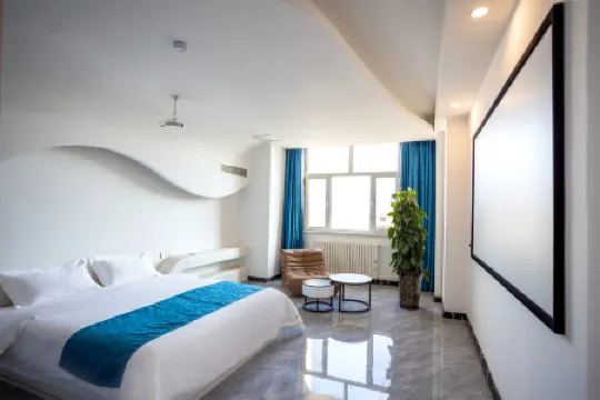 Muzan Hotel (Exhibition Hall Subway Station Bolton Plaza) Отели в г. Хух-Хото