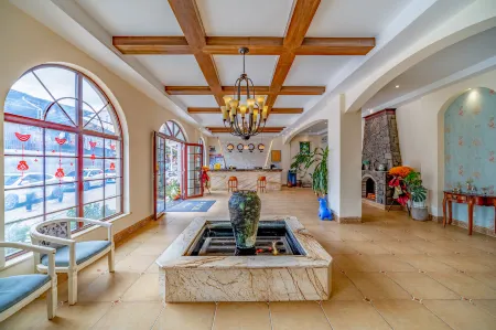 Mengzi Fengjing Boutique Hotel Отели рядом с достопримечательностью «Honghe College»