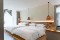Emeishan Sanyuan Shuzhuang Home Stay Hotels near Qingyin Pavilion
