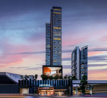 JOY Junyin Designer Hotel Отели рядом с достопримечательностью «Guizhou Normal University - College of Fine Arts»