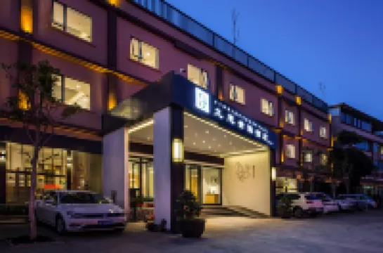 Puer Jiusi Suyuan Hotel