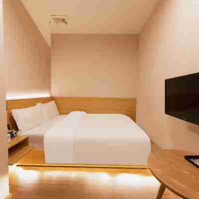 Fushun New Longji Hotel Rooms