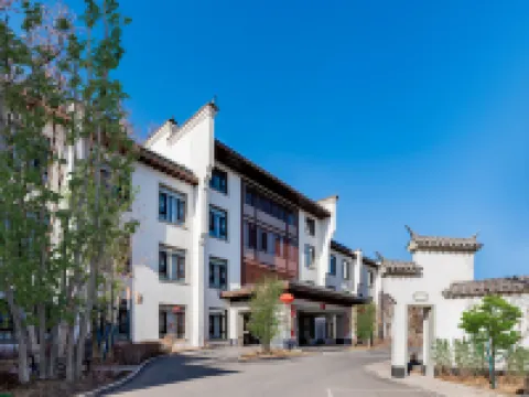Jinghong Tianqing Hotel (Yijin Holo City Government Shop)