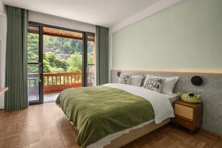 Story Mountain Wind Holiday Bed and Breakfast Отели рядом с достопримечательностью «Zhaoxing Dong Village»