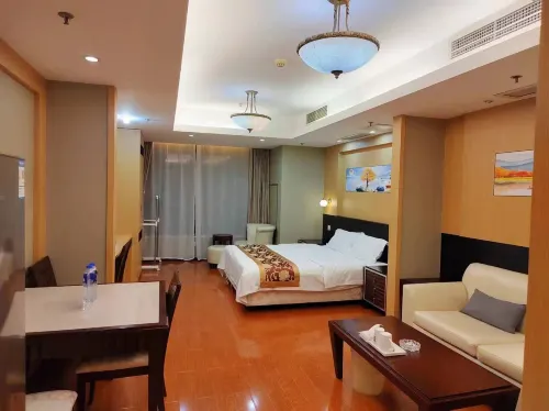 Aihe Jinlun Apartment Hotel