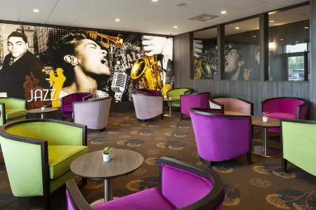 Hôtel Roi Soleil Prestige Plaisir - St Quentin Отели в г. Ивелин