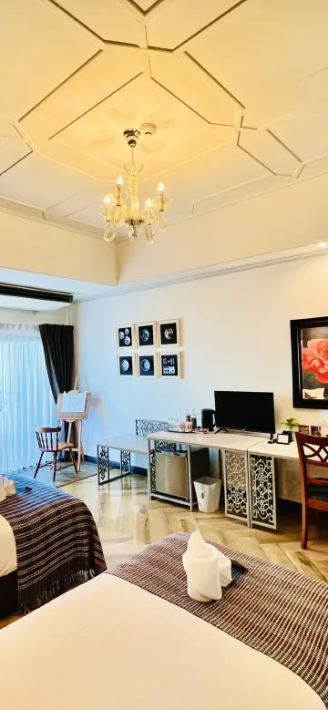 ห้องดีลักซ์เตียงคู่หรือเตียงแฝดพร้อมระเบียง