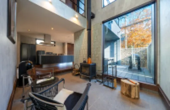 River view house with BBQ & private sauna, wood stove — designer villa with stone terrace & fire