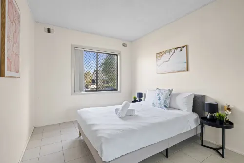 Well-Located 2BR Apartment in Auburn – Walk to Station & Shops