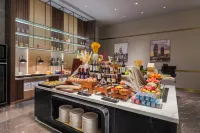 Park Inn by Radisson Nanchong Yilong Star City Plaza - servizio colazione