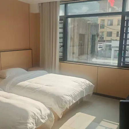 Qixiong Hotel (Huajiang Bus Station)
