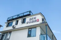 Xingyi Blue Moon Bay Xinglin Courtyard Homestay (Wanfenglin Scenic Area Shangnahui) - พร้อมอาหารเช้า