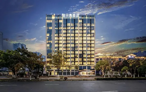 Duogao Hotel (Shengzhou China Yue Opera Art City Wuyue Plaza Branch) - parking