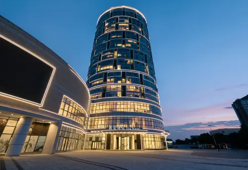 Xincheng Hotel (Yantai University International Expo Center Branch) - 4-نجوم