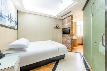 Yiwu Jane 'ai Fashion Hotel (Binwang Business and Trade Zone) Отели рядом с достопримечательностью «Luo Binwang Park»