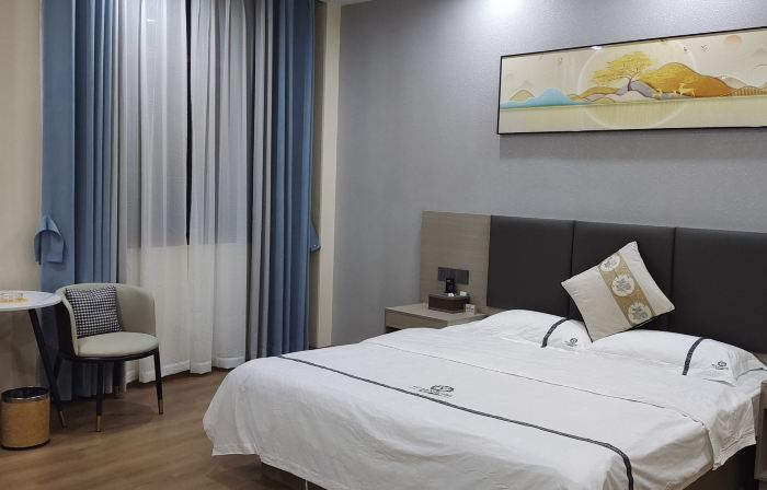 Shidian Magnolia Business Hotel