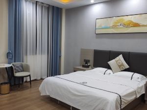 Shidian Magnolia Business Hotel