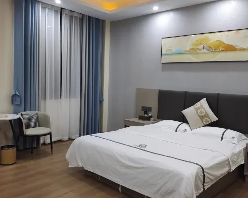 Shidian Magnolia Business Hotel Hotels in Shidian