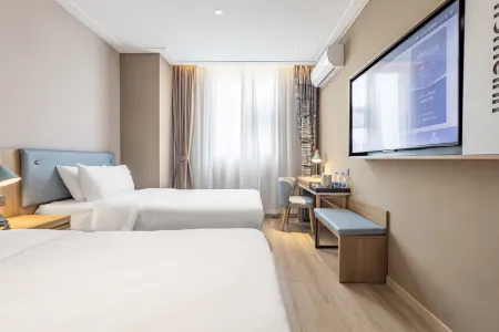Home Inn Neo (Yixing Renmin Middle Road Branch) Отели рядом с достопримечательностью «Longbeishan Forest Park»