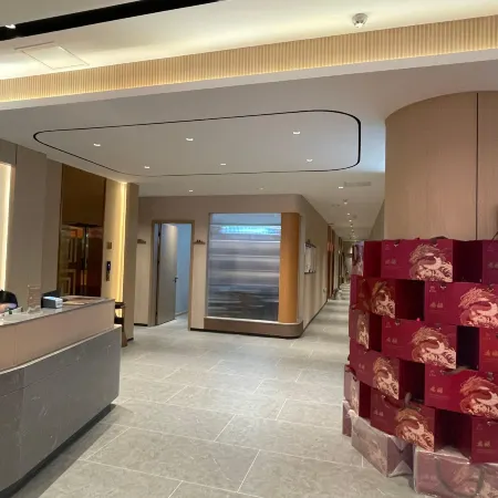 Mengdie Hotel (Minquan Zhuangzi Culture Square North Railway Station)
