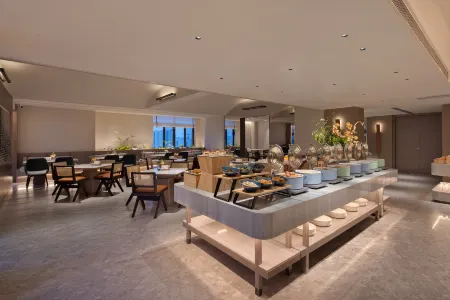 Fuyang Yunbo Manju Hotel (Yingzhou Wanda Plaza Long Distance Bus Station Store) Отели рядом с достопримечательностью «Fuyang Shuangqingwan Park»