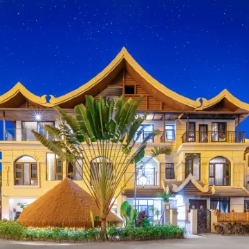 Xishuangbanna Jinghong Yakatu Theme Inn (Mengle Dafo Temple) Отели рядом с достопримечательностью «Культурный Экспо-Экспонат по Эксперту»
