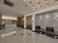 Magnotel Business Hotel (Longjiang Zhigang Plaza) - 2-Star