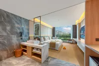 Chengdu Qiyu Riverside Hotel (Wenjiang Yongquan Subway Station Hopson Mall) Отели рядом с достопримечательностью «Луцзянь Бич»