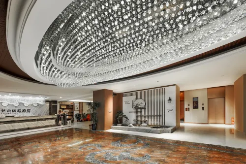 Huaxian Jinlong Business Hotel (Huayi High-speed Railway Station) - 2 stjerner
