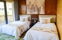 Bai Ma Lake Wetland Hotel Hotels near Bihe Pavilion