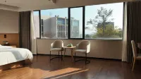 Xiongzhou Grand Hotel - parcheggio