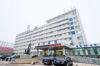 天津濱海新區遠洋賓館（濱海高鐵站店） 天津市濱海新區塘沽濱海職業培訓中心附近的飯店