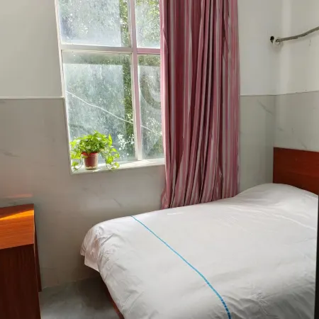 Xinxian Huixin Supermarket Business Hotel