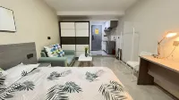 Hua'an Hotel style Apartments Отели рядом с достопримечательностью «Нингбо Открытый университет»