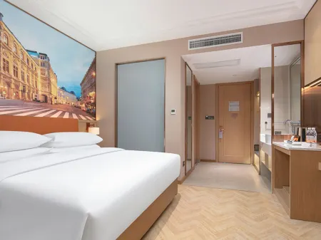 Vienna Hotel (Jishou High-Speed Railway East Station) Отели в г. Цзишоу