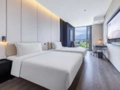 โรงแรมเอทัวร์ สถานีรถไฟ เอ๋อเหม่ยซาน ทะเลสาบเอ็กซิ่ว โรงแรมในเอ๋อเหม่ยซาน