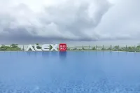 Vienna International Hotel (Haikou Binhai Avenue Xixiu beach branch) - شاطئ