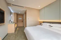 Hangzhou Nuomeihua Business Hotel (Shengtangyang Commercial Complex) Отели рядом с достопримечательностью «Цинхуань»