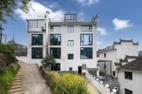 Wuyuan Guling Yunshangshangju Suites Hotels near Wuyuan Huangling Scenic Area - Viewing Point