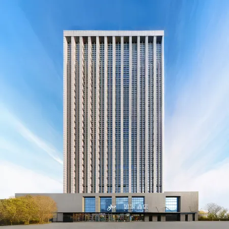 Home Inn (Urumqi Xinbei Yuanchun Anjia Building Store)