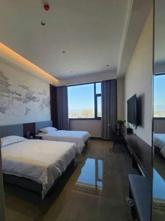 Shunli Jufu Hotel (Dai County) Отели в г. Дайсянь