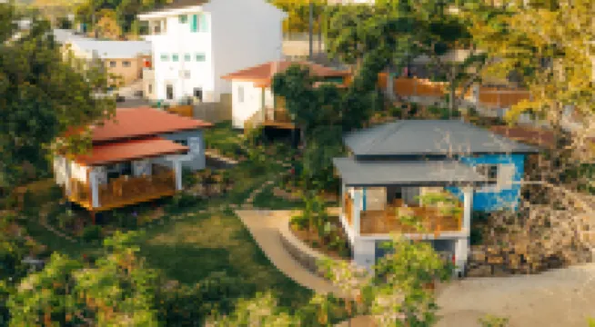Auguste's Creole Houses in a Tropical Garden