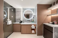 Tanyue Seaview Hotel (Zhanjiang Jinshawan Beach Wanda Plaza Branch) - 2 ดาว
