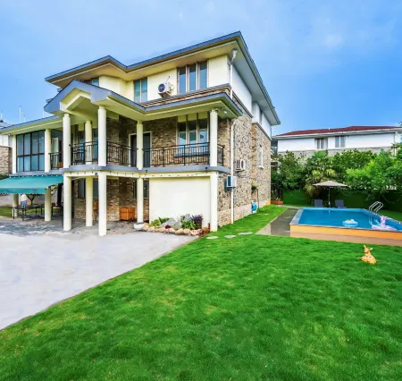 Kunshan Diffuse Time Villa (Yangcheng Lake Store) Отели рядом с достопримечательностью «Bacheng Yinhua Yijing Langman Huahai Theme Amusement Park»