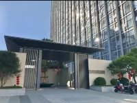 Yiban Apartment (Longguang Century Business Center Shantou High-Speed Railway Station)
